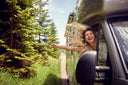 A person improving indoor air quality in their RV while traveling.