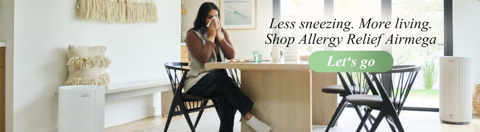 A person sneezing.