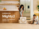 Mighty2 in kitchen with mom, child, and dog