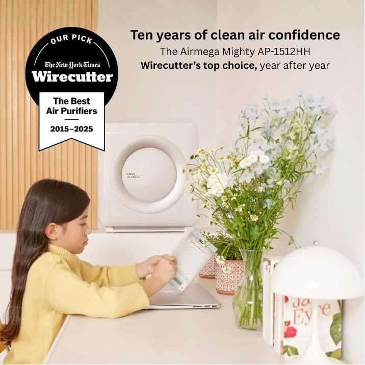 An award-winning Airmega air purifier with the Wirecutter seal next to it.