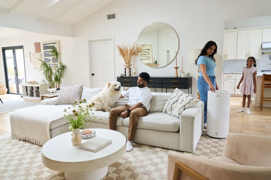 A family with a dog and Airmega 350